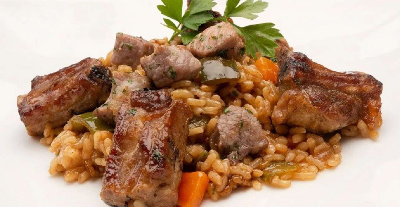 Arroz con costillas de cerdo, delicioso plato que no podrás resistir