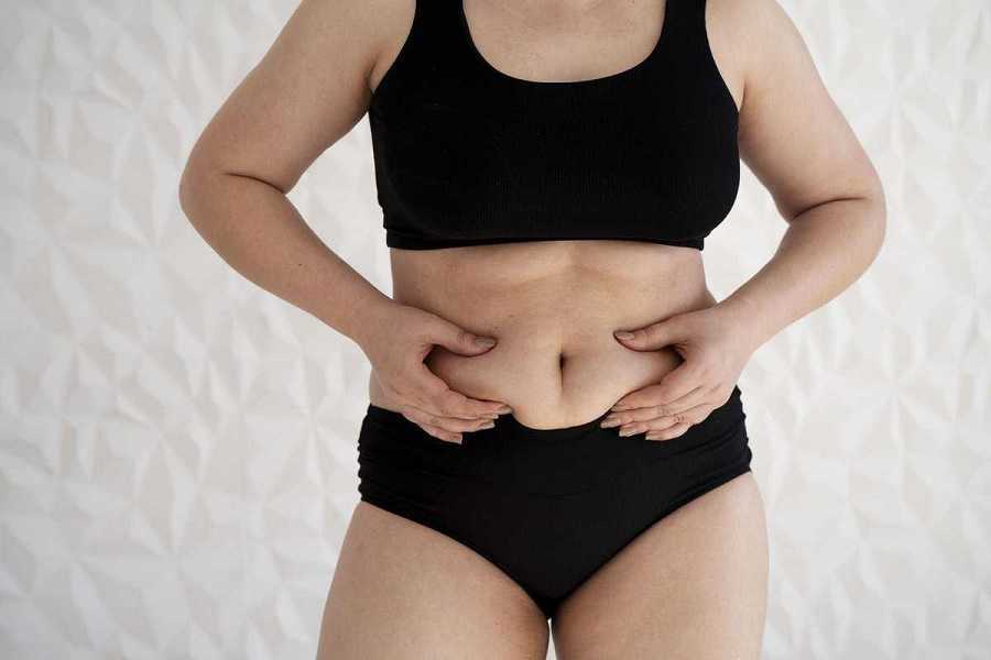 Por qué tienes grasa abdominal