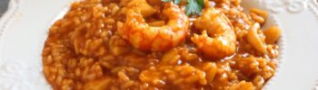 Receta e ingredientes para preparar arroz meloso de pollo o de mariscos