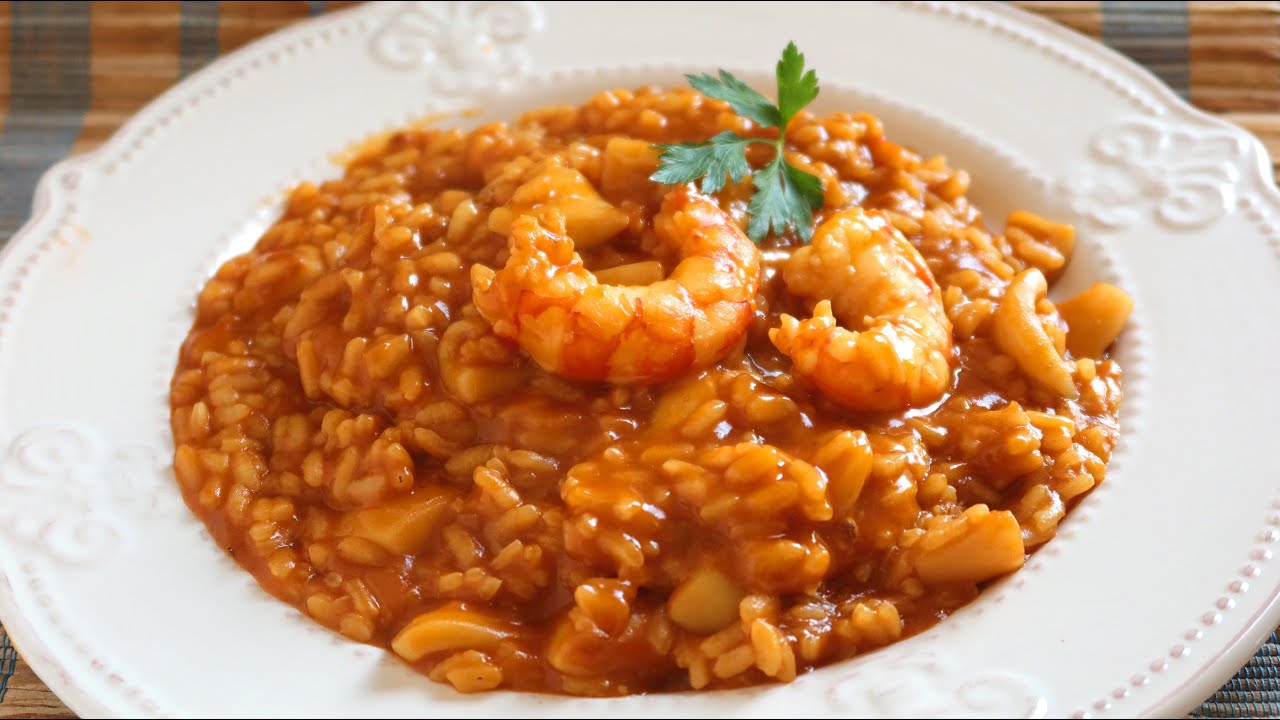 Receta e ingredientes para preparar arroz meloso de pollo o de mariscos