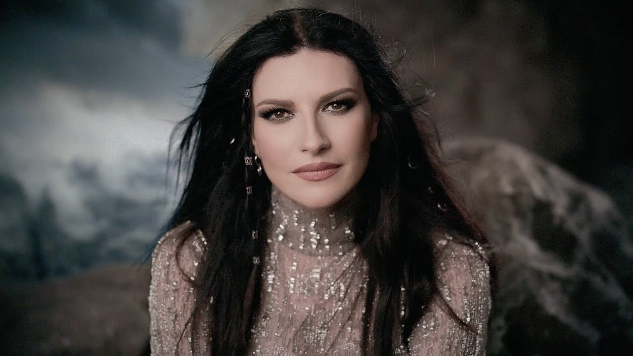Mi historia entre tus dedos letra versiones Laura Pausini versión